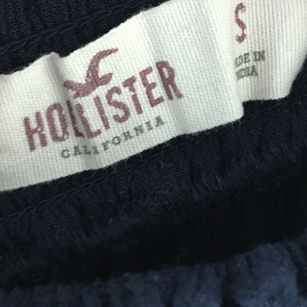 Hollister Navy Floral Embroidered Smocked Off the Shoulder Bell Sleeve Top - Picture 8 of 10